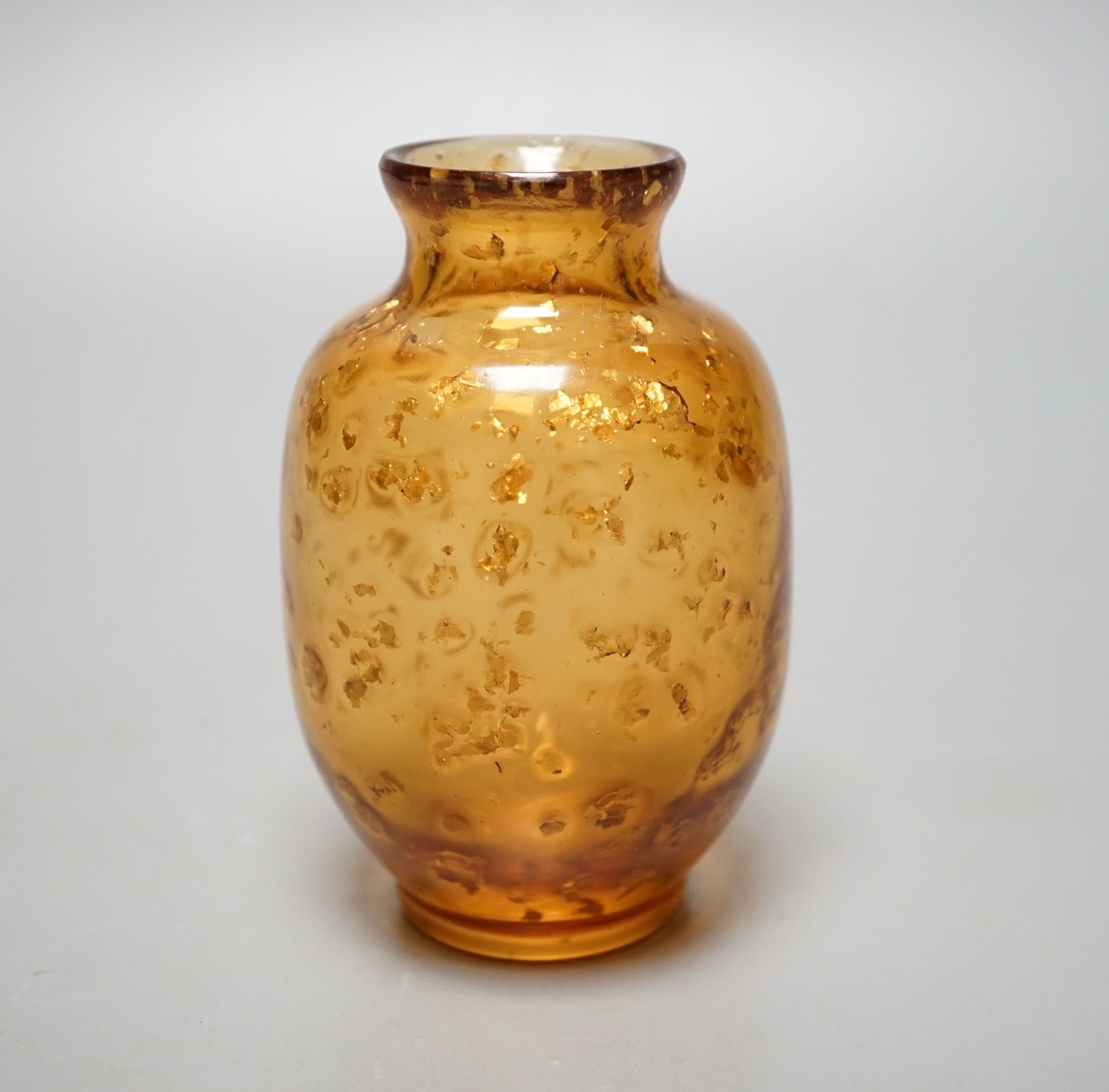 A Chinese gilt included amber glass vase., 9 cms high.